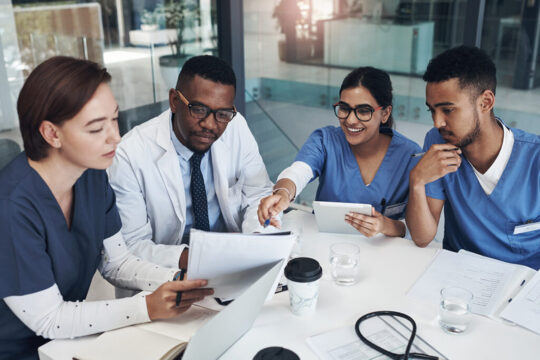 financial advisor consulting with healthcare workers